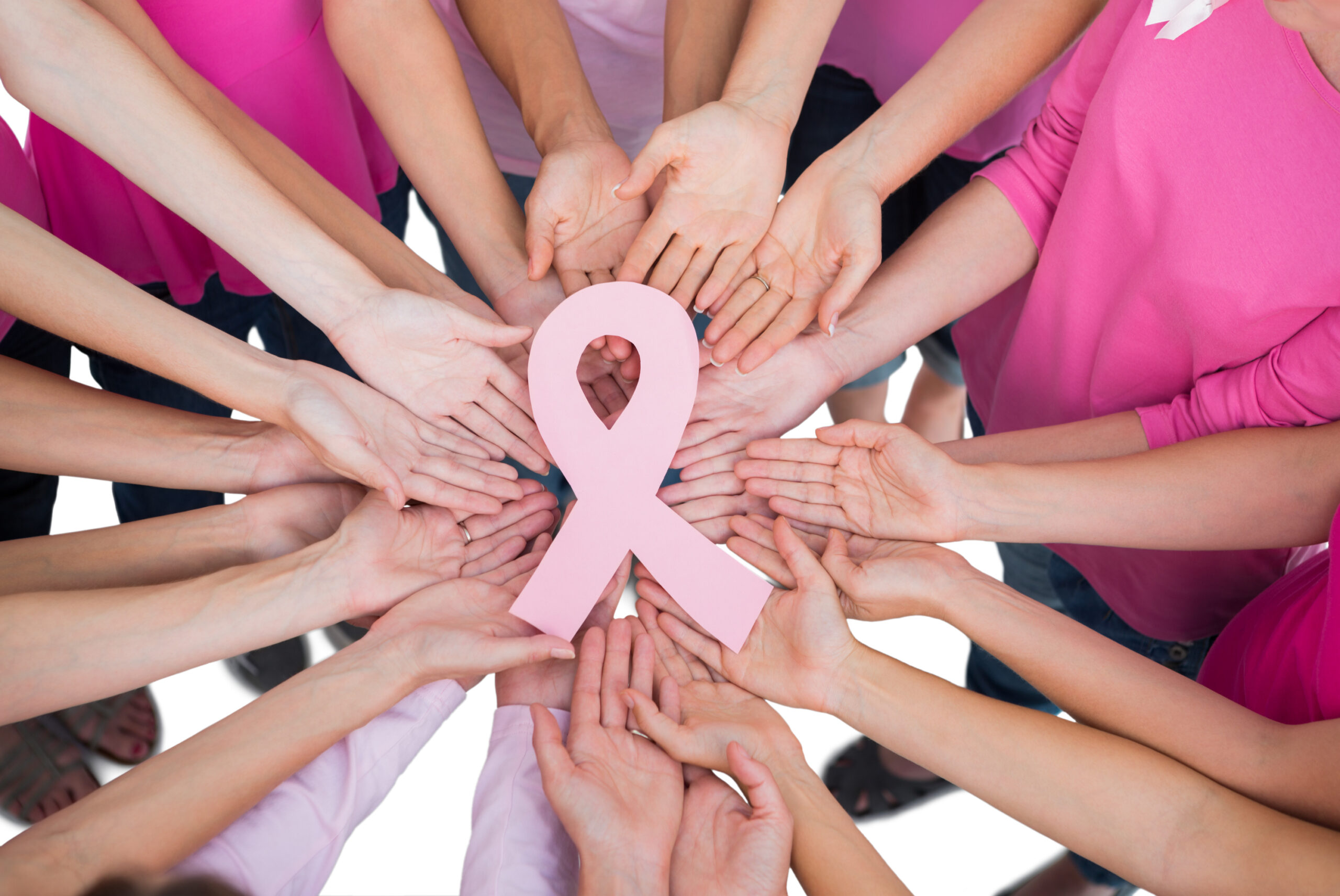 Hands joined in circle holding breast cancer struggle symbol on white background edited scaled