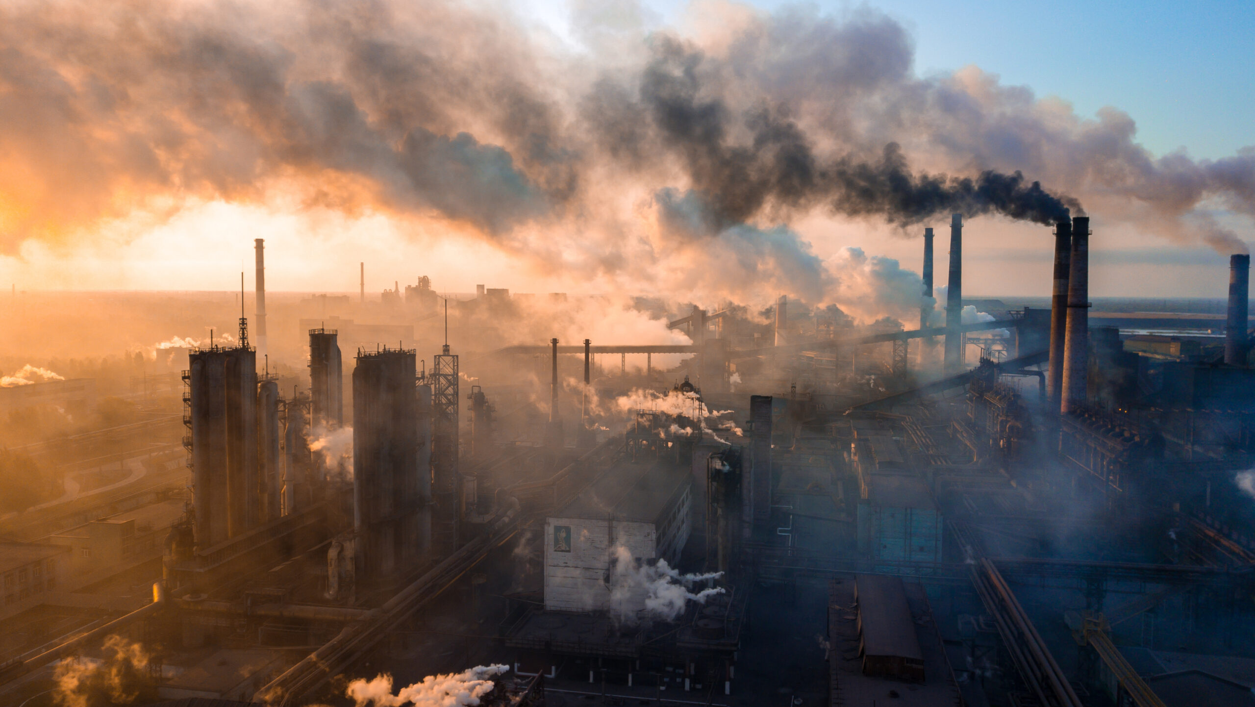 industry metallurgical plant dawn smoke smog emissions bad ecology aerial photography edited scaled